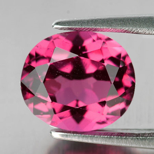 7.5x6.5 mm { 1.21 cts} Oval Brilliant Cut AAA Fire Intense Pink Tourmaline Natural {VVS} 7.5x6.5 mm { 1.21 cts} Oval Brilliant Cut AAA Fire Intense Pink Tourmaline Natural {VVS}