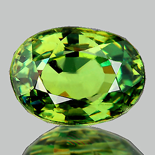 6x4.5 mm { 0.78 cts } Oval AAA Luster Rainbow Sparkle AAA Green Demantoid Natural ( Flawless-VVS )