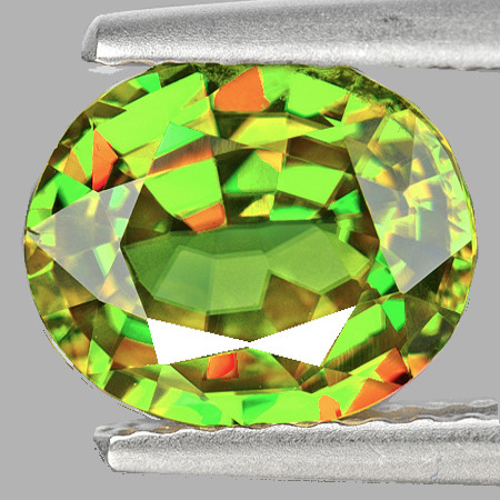 7x5.5 mm { 1.03 cts } Oval Excellent Rainbow Flash Intense Green Sphene Natural { Flawless-VVS }--AAA Grade