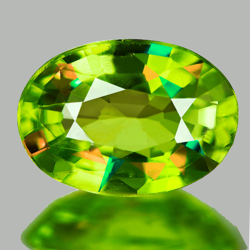 8x6 mm { 1.55 cts } Oval Excellent Rainbow Flash Natural Green Sphene { VVS }