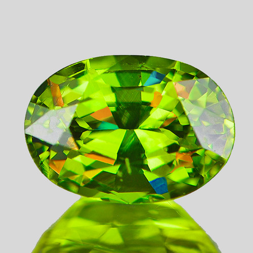 7.5x5 mm { 1.33 cts } Oval Excellent Rainbow Flash Intense Green Sphene Natural { Flawless-VVS }--AAA Grade