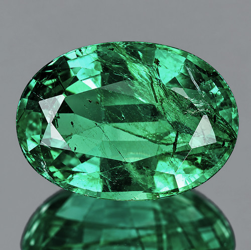7x5 mm{ 0.66 cts } Oval AAA Neon Intense Green Emerald Natural  { AAA Grade }