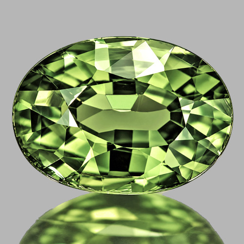 7x5 mm{ 1.00 cts } Oval AAA Fire Natural Golden Green Sapphire {Flawless-VVS}