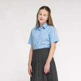 Zeco girls short sleeve school blouses in blue, worn, side view, close up