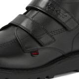 Close up of Kickers Kick Hi Vel black leather school shoe showing Velcro strap stitching and Kickers logo badge