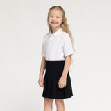 Zeco stretch pleated skirt regular length in navy, worn, side view, close up