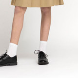 White Zeco ankle socks worn with a school skirt and black shoes