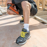 Black and grey lightweight safety trainer with mesh upper, scuff cap and reflective detail