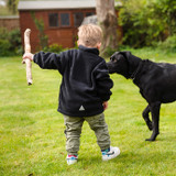 Child's navy full zip fleece jacket with fleece lined pockets and reflective triangle on the chest