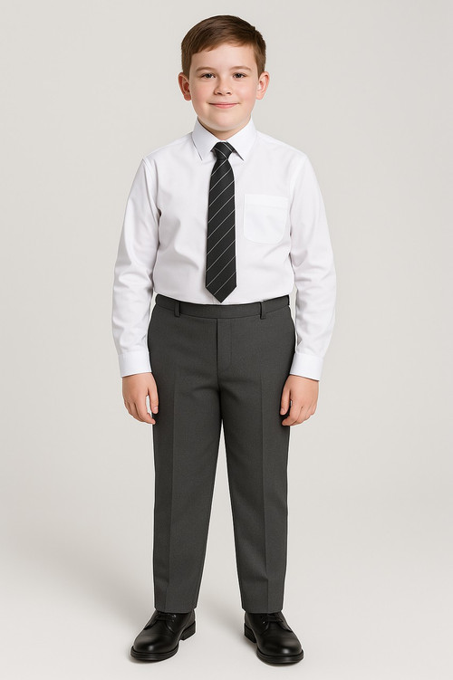 A photograph features a 12-year-old schoolboy dressed in a smart school uniform. He is wearing a crisp white shirt, a striped tie, and grey plus-size school trousers with a tapered fit. The trousers have a classic schoolwear look with an elasticated waistband and clasp fastening, tailored for comfort and durability. The boy stands confidently against a neutral background, showcasing the full fit of the trousers.