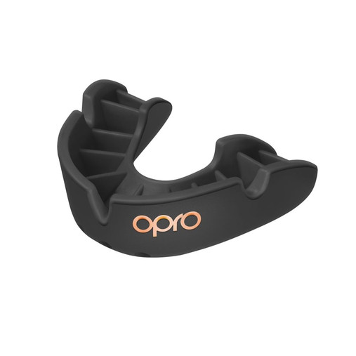 Opro Bronze Mouthguard close up of black self fit gum shield for rugby, boxing and contact sport Opro Bronze Mouthguard close up of black self fit gum shield for rugby, boxing and contact sport
