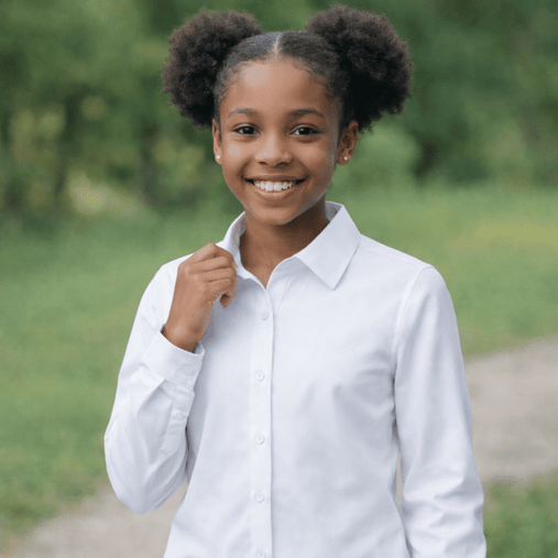 girl wearing white school blouses as part of school uniform outdoors