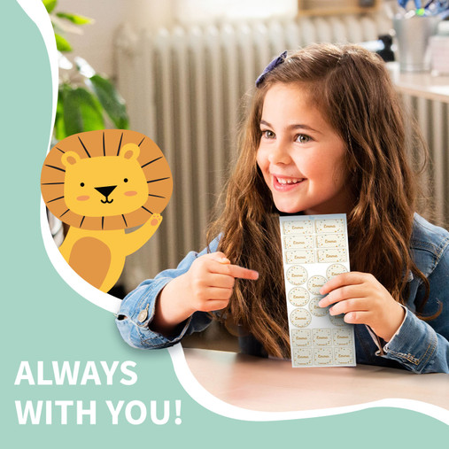 Child holding a sheet of Easy2Name pattern name stickers for school clothes