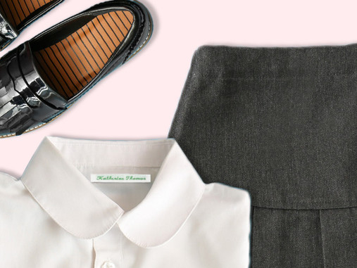 Woven name tape sewn into a school shirt collar, with a pinafore and school shoes