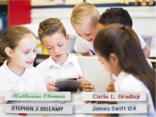 School children with examples of Easy2Name woven name tapes in different styles and colours