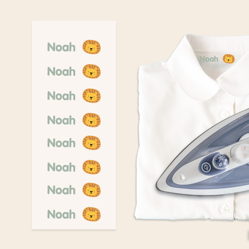 Easy2Name iron-on name transfers with a lion icon, ironed into a white school shirt