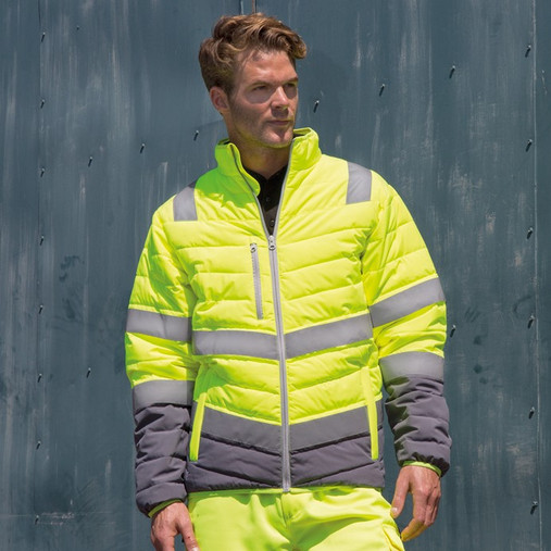Hi vis yellow padded safety jacket with grey trim, reflective bands and zip through collar