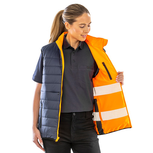 Reversible padded gilet in hi vis orange with reflective bands, navy reverse and stand up collar