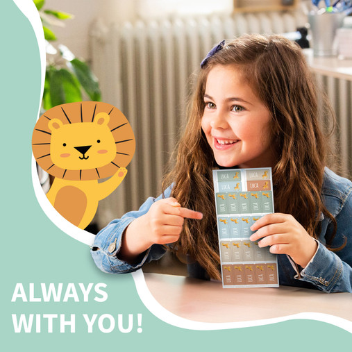 Girl smiling with a sheet of Easy2Name theme with icon name stickers