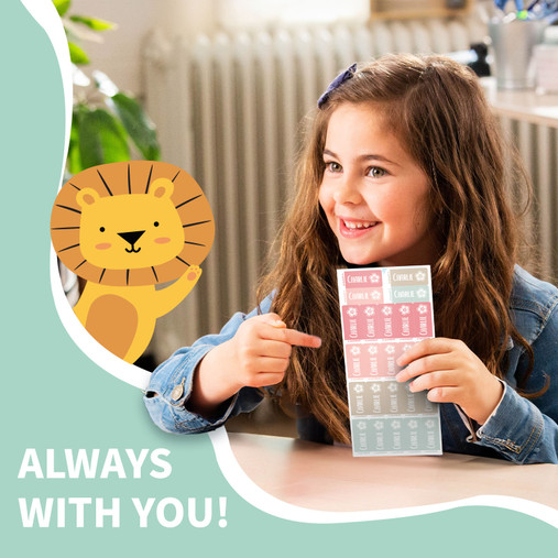 Girl smiling with a sheet of Easy2Name multi colour name stickers