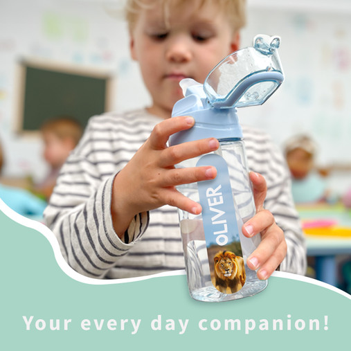 Toddler drinking from a personalised water bottle with the name Oliver and a lion picture