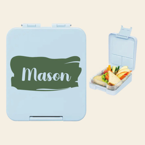 Light blue personalised lunch box with the name Mason on a green brush stroke, and an open box with compartments