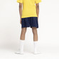 Zeco white lace-up school plimsolls, worn, back view, close up