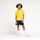Zeco white lace-up school plimsolls, worn, front view