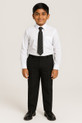 This image showcases a  schoolboy, around 12 years old, standing in full uniform. He wears a white school shirt paired with a striped tie and sturdy black plus-size school trousers designed for a comfortable fit. The trousers feature an elastic waistband and straight, tapered legs, offering a clean and professional schoolwear appearance. The boy’s relaxed posture and subtle smile reflect both comfort and confidence.