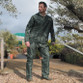 Model wearing Result men’s waterproof jacket and trousers set in black – outdoor rain suit Model wearing Result men’s waterproof jacket and trousers set in black – outdoor rain suit