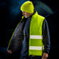 Reversible padded gilet in hi vis orange with reflective bands, navy reverse and stand up collar
