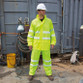 Fluorescent yellow waterproof jacket and trousers with reflective bands and a hood in the collar