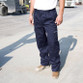 Plain work trousers with knee pad pockets, thigh pocket with reflective trim and hammer loop