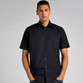 Mens short sleeve work shirt with button down collar and a shaped hem, shown in light blue