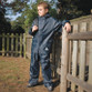 Child's navy waterproof jacket with hood and matching waterproof trousers with reflective triangles