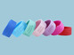 A row of personalised silicone bottle name bands in blue, green, pink, purple and red
