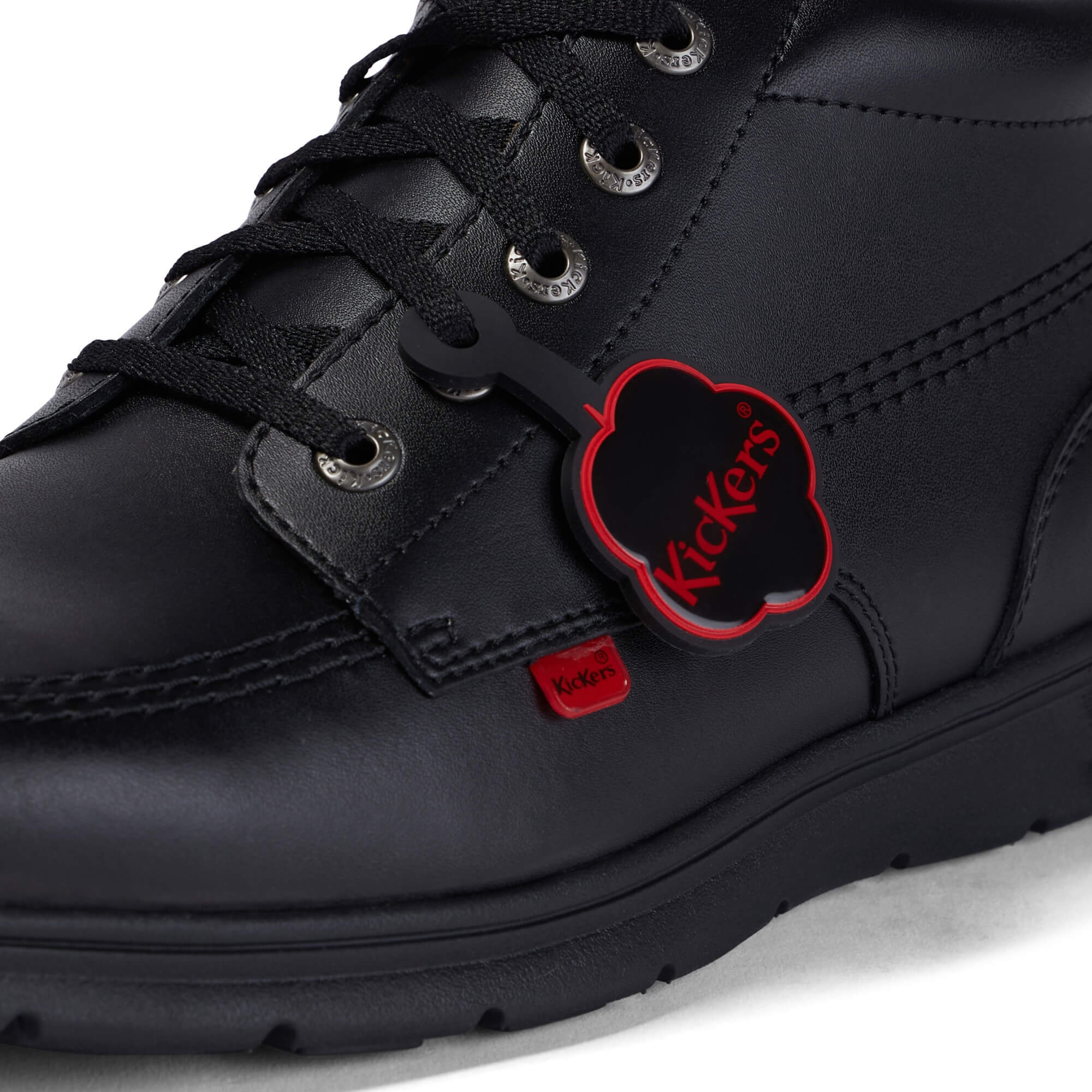 Kickers Kelland Hi black leather school shoe side view showing high top design and cushioned collar