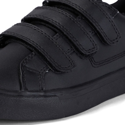 Kickers Tovni Trip Junior leather black school shoes side view showing triple Velcro strap and low-profile sole