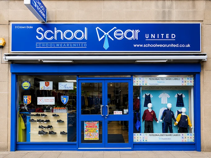 The School Wear United shopfront at 3 Crown Dale, with its blue sign, school shoes and uniform on display in the windows