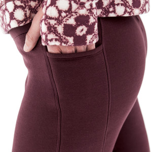 Close-up of burgundy Aventura Clothing Dog Walker Fleece Legging showing side drop-in pocket detail.