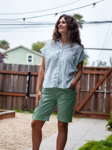 Woman standing outdoors wearing Arden V2 Short in green