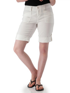 Front view of woman wearing white Aventura Arden Roll Up Organic Shorts.