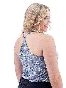 Rear view of the Linden Strappy Floral Tank Top. The image highlights the distinctive strappy Y-back construction and the adjustable strap hardware against the floral pattern.