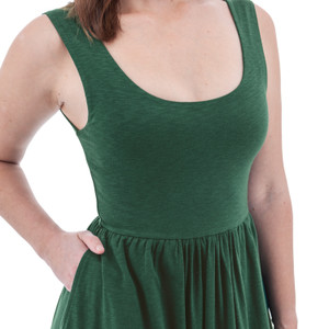 Front bodice of green Aventura Clothing Linden Fit & Flare Tank Dress, highlighting scoop neck and side pocket detail.