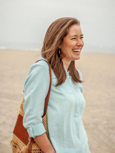 Woman wearing Laken Popover Top in Crystal Blue