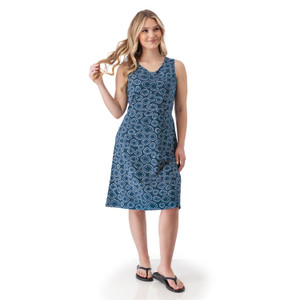 Woman modeling sleeveless Aventura Clothing Cali Fit & Flare Printed Dress in a blue geometric circle pattern.