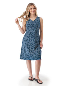 Woman modeling sleeveless Aventura Clothing Cali Fit & Flare Printed Dress in a blue geometric circle pattern.