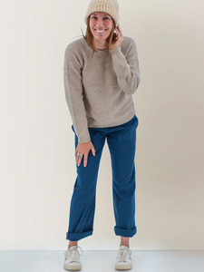 Woman wearing the Mabel Textured Fairisle Crew Neck Sweater in heather oatmeal light brown.