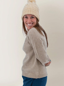Left shoulder view of the Mabel Textured Fairisle Crew Neck Sweater in heather oatmeal light brown.