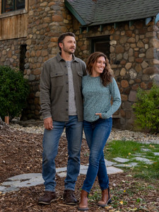 Woman standing outside during fall wearing the Tatum Organic Cotton Floral Long Sleeve Top in green.